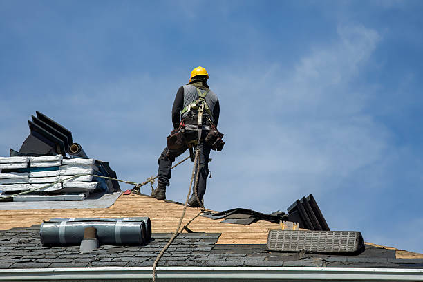 Professional Gutter Installation technician working in Rockdale, TX